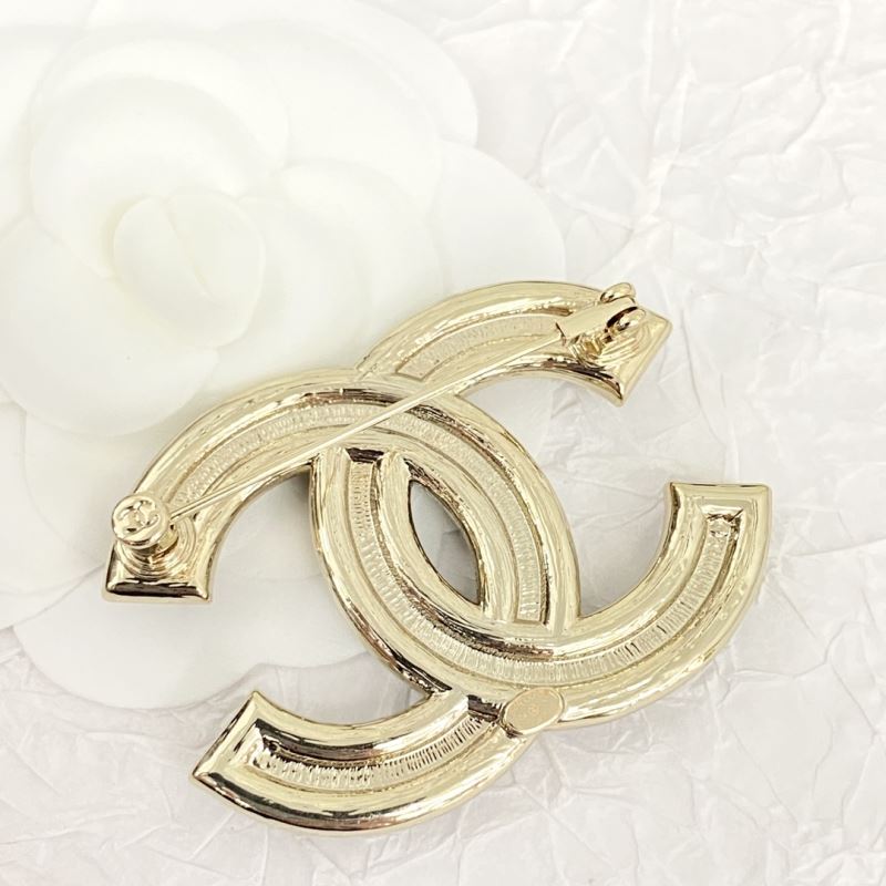 Ch**el brooches